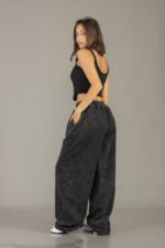 Pantalón palazo procesado liso color negro - foto 11